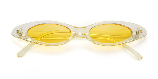 Clear frame cat eye sunglasses with bright yellow lenses, suitable for fashion wear and sun protection. - Image 51