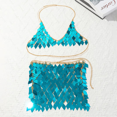 Woman wearing a gold-tone body chain top with iridescent pink and orange diamond-shaped sequins, perfect for beach or festival. - Image 33
