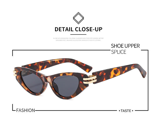 Black cat-eye sunglasses with dark gray lenses and gold-tone hinge accents on a white background. - Image 17