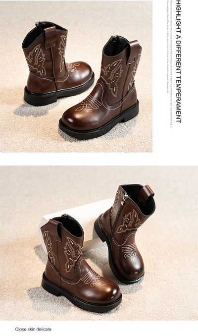 Girls' brown Martin boots with white ethnic embroidery, side zippers, and black soles, displayed on a light carpet. - Image 29