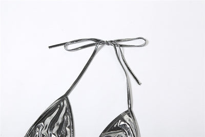 Purple reflective two-piece bikini with a halter neck top and tie-side bottoms, featuring a shiny solid color fabric. - Image 23