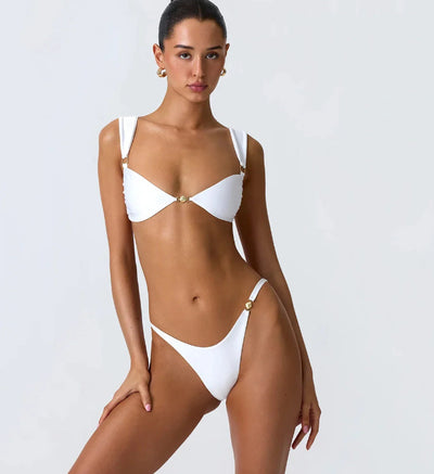 Women's white seamless bikini swimsuit with wide shoulder straps and gold ring details on top and high-cut bottom. - Image 7
