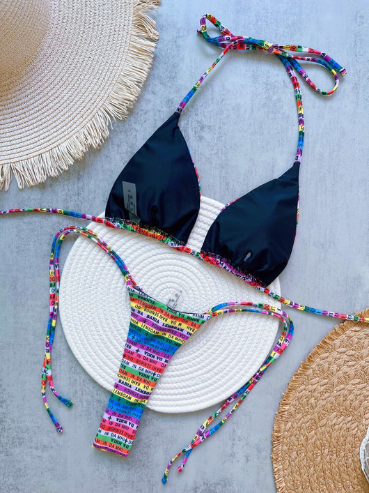 Women's multicolor letter printed lace-up bikini suit with triangle top and thong bottom, displayed on a white mat. - Image 10