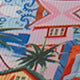 Women's colorful printed bikini swimsuit with a tropical and architectural design, featuring a halter triangle top and high-cut bottom. - Image 14