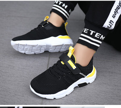 Boy's black and blue sports shoes with orange accents, mesh upper, white sole, blue laces, and a Velcro strap. - Image 44