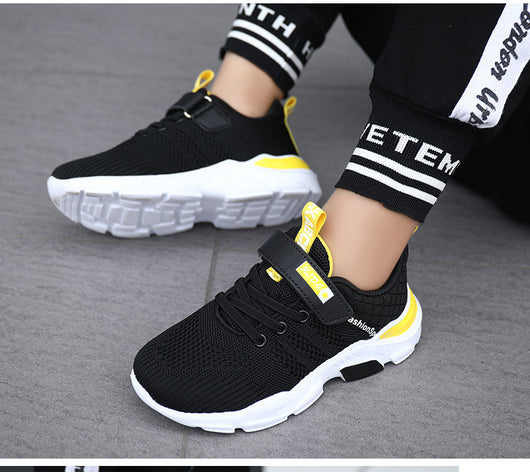 Boy's black and blue sports shoes with orange accents, mesh upper, white sole, blue laces, and a Velcro strap. - Image 44