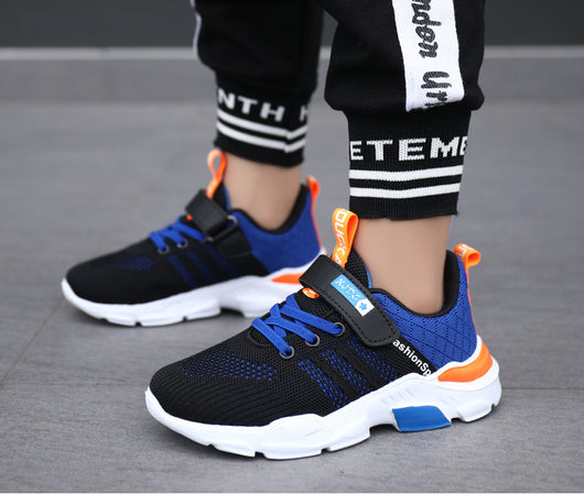 Boy's black and blue sports shoes with orange accents, mesh upper, white sole, blue laces, and a Velcro strap. - Image 28