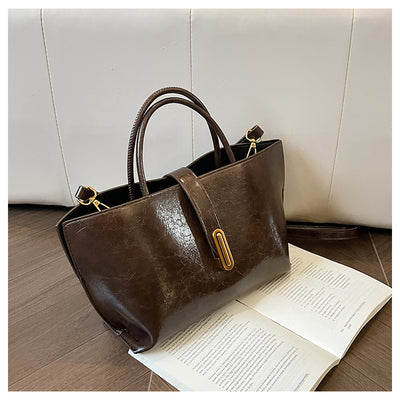 Bolso Bucket de Cuero Encerado Elegante y Portátil - Image 49