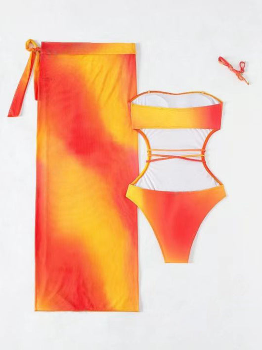 Blue ombre one-piece swimsuit with side cutouts and a matching blue ombre sarong with tie closure. - Image 44