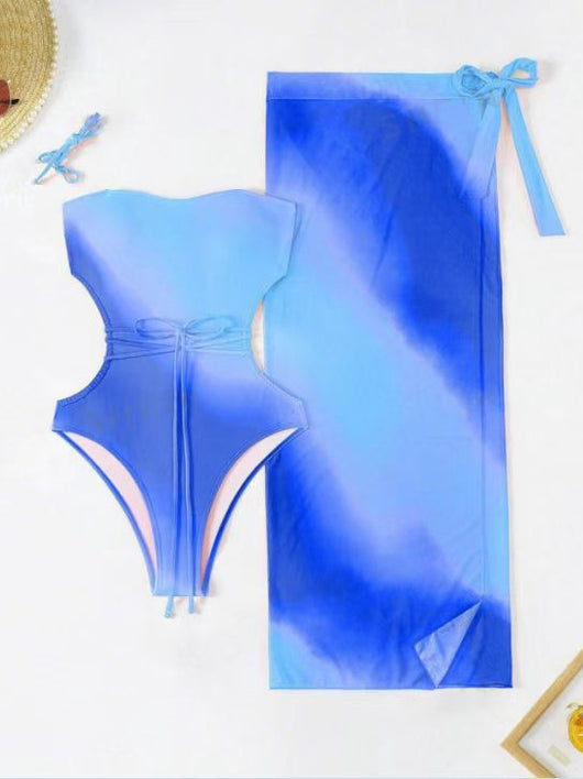 Blue ombre one-piece swimsuit with side cutouts and a matching blue ombre sarong with tie closure. - Image 14