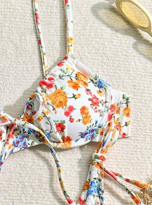 Women's white floral two-piece bikini with red, orange, and blue flowers, featuring a tie-front top and tie-side bottoms. - Image 12