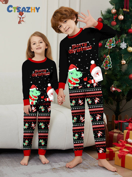 Man wearing black Christmas pajamas with a cartoon dinosaur, Santa Claus, and "Merry Christmas" text, standing by a decorated tree. - Image 37