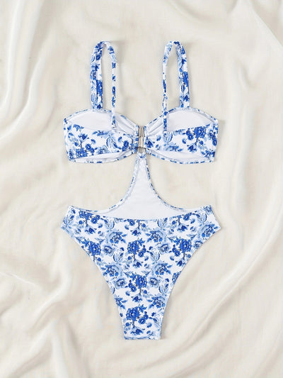 Blue and white floral one-piece swimsuit with a V-bar detail and side cut-outs, perfect for summer. - Image 19
