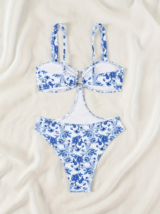 Blue and white floral one-piece swimsuit with a V-bar detail and side cut-outs, perfect for summer. - Image 19