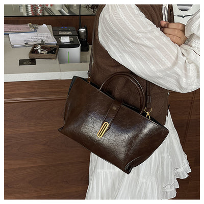 Bolso Bucket de Cuero Encerado Elegante y Portátil - Image 21