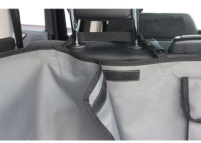 Black waterproof 600D Oxford cloth pet mat covering a vehicle's cargo area, featuring side flaps and a storage pocket. - Image 10
