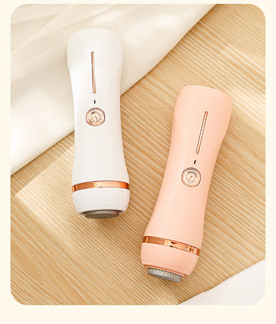 Orange pink portable electric foot grinder with a matte finish and rose gold accents, featuring a power button and grinding head. - Image 12