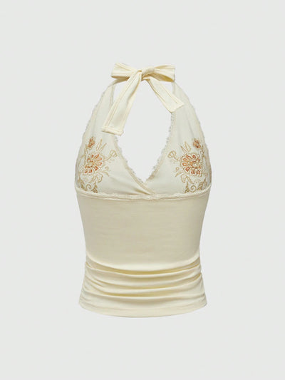 Chaleco Halter de Encaje Floral Bordado Ajustado y Estilizador - Image 9