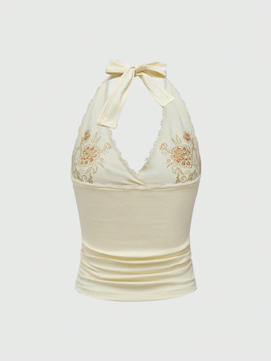 Chaleco Halter de Encaje Floral Bordado Ajustado y Estilizador - Image 9