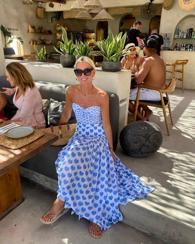 White shorts with blue heart print and ruffled sides, perfect for a fun vacation or casual summer day. - Image 71