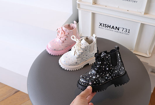 White toddler girls' boots with a holographic star pattern, lace-up front, and side zipper closure. - Image 27