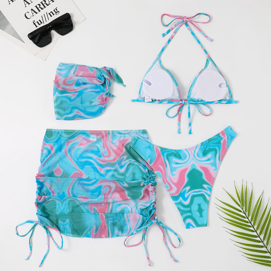 Four-piece tie-dyed bikini swimsuit set in orange, yellow, and white, with a triangle top, high-cut bottoms, ruched mini skirt, and matching headscarf. - Image 18
