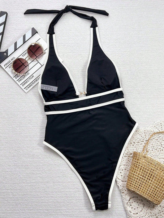 Traje de Baño Enterizo con Tirantes - Diseño Cruzado Negro y Blanco - Image 13