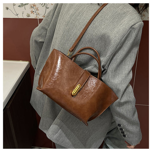 Bolso Bucket de Cuero Encerado Elegante y Portátil - Image 27