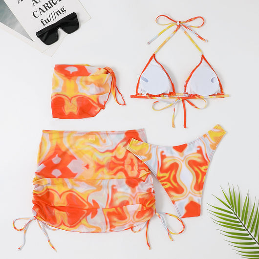 Four-piece tie-dyed bikini swimsuit set in orange, yellow, and white, with a triangle top, high-cut bottoms, ruched mini skirt, and matching headscarf. - Image 26