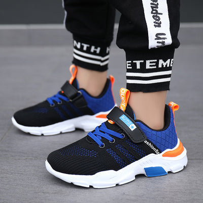 Boy's black and blue sports shoes with orange accents, mesh upper, white sole, blue laces, and a Velcro strap. - Image 40