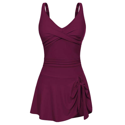 Hot pink one-piece swimdress for women featuring a ruched v-neck bodice and a skirted bottom with a side tie detail. - Image 15