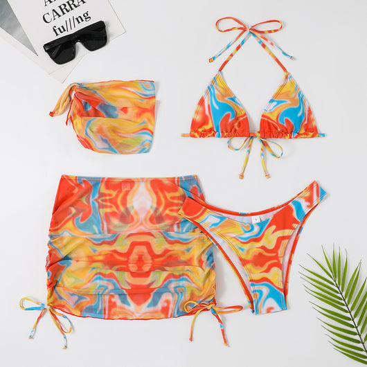 Four-piece tie-dyed bikini swimsuit set in orange, yellow, and white, with a triangle top, high-cut bottoms, ruched mini skirt, and matching headscarf. - Image 28