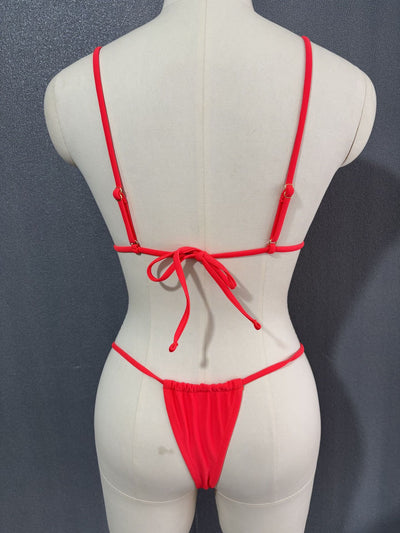 White three-point bikini with gold chain straps on a mannequin, featuring a triangle top and thong bottom. - Image 44