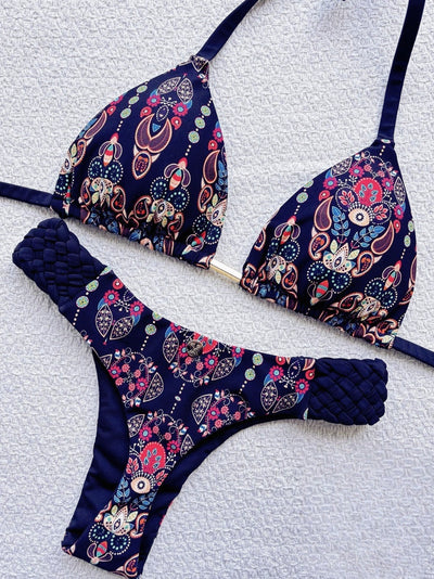 Women's blue, white, and gold marble print bikini with a triangle halter top and braided rope side details. - Image 28