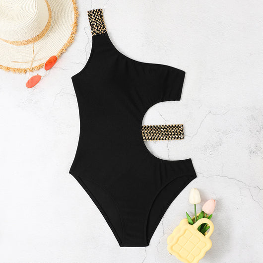 Black one-shoulder one-piece swimsuit with side cut-outs and gold chain-link detailing on strap and waist. - Image 11