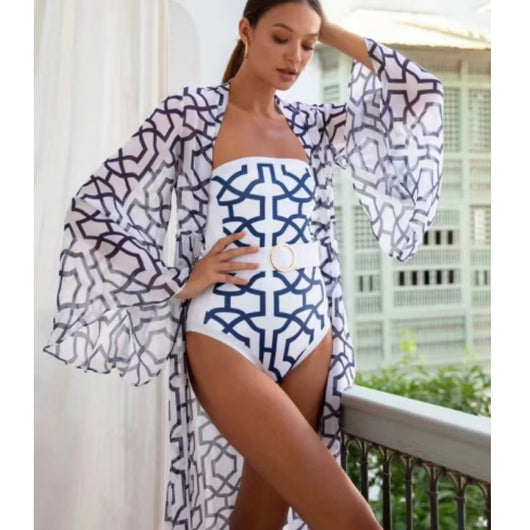 Woman in black and white floral print one-piece swimsuit with matching long-sleeved kimono cover-up and white belt. - Image 16