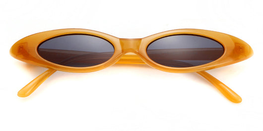Clear frame cat eye sunglasses with bright yellow lenses, suitable for fashion wear and sun protection. - Image 47