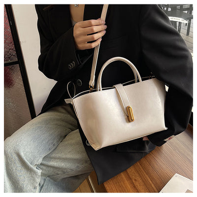 Bolso Bucket de Cuero Encerado Elegante y Portátil - Image 61