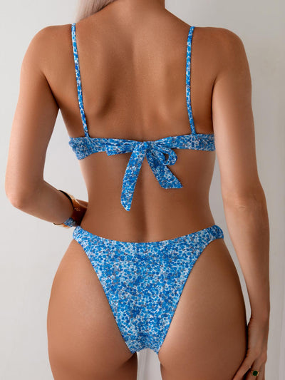 Women's green floral print bikini set with a ruched top, adjustable straps, and matching bottoms. - Image 29