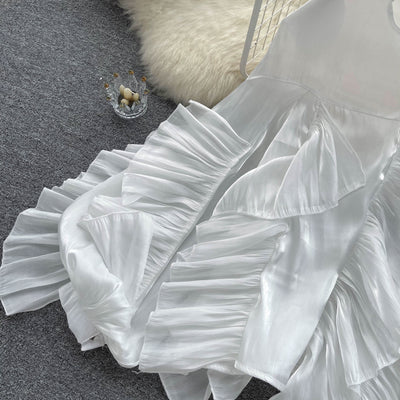 Blusa Larga de Gasa con Volantes Irregulares y Mangas Largas - Image 12