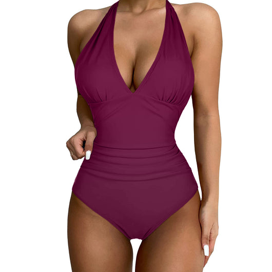 Black halter one-piece swimsuit with a deep V-neck and ruched detailing, designed for a slimming vacation look. - Image 17