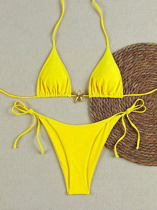 White women's bikini with triangle top and tie-side bottom, featuring a gold starfish charm on the center front. - Image 32