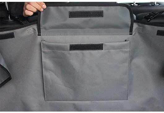 Black waterproof 600D Oxford cloth pet mat covering a vehicle's cargo area, featuring side flaps and a storage pocket. - Image 8
