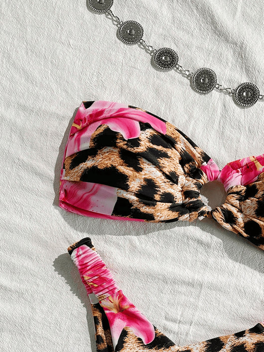 Women's tube top bikini swimsuit with a pink floral and leopard print, featuring a twisted front top and high-cut ruched bottom. - Image 13