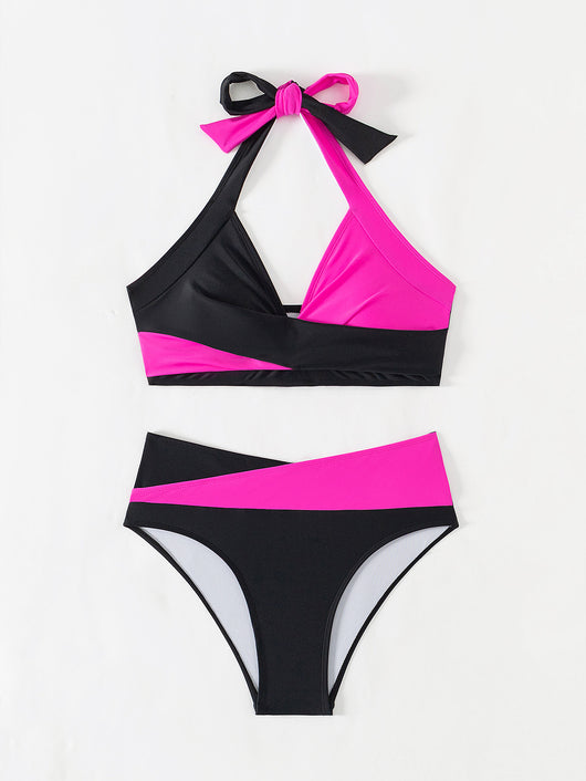 Black and white color-block halter bikini with high-waisted bottoms, modeled by a woman holding a straw hat. - Image 22