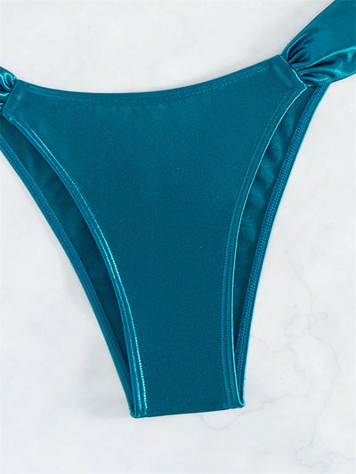 Solid black glossy two-piece bikini with a bandeau top featuring a ruched front and U-shaped detail, and high-cut ruched bottoms. - Image 11