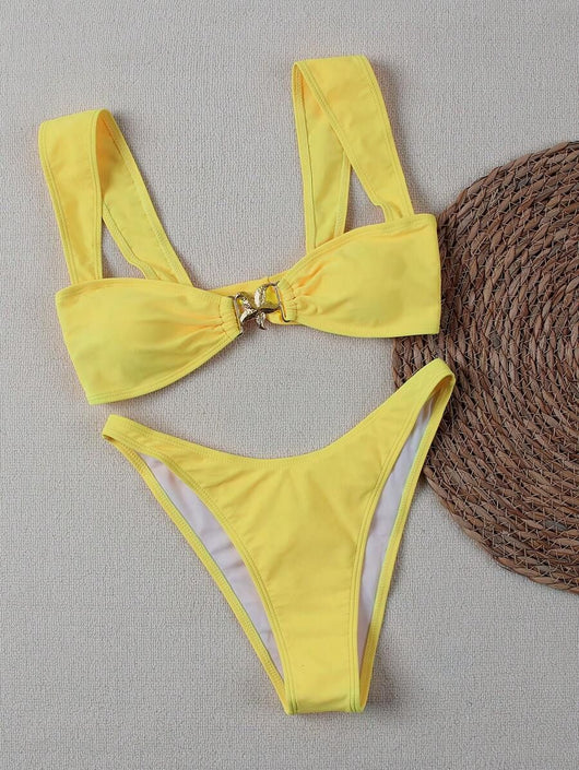 Bright yellow bikini with wide shoulder straps and a gold metal decoration on the top, worn by a woman. - Image 22