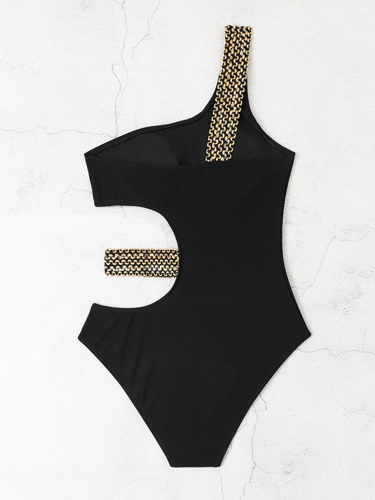 Black one-shoulder one-piece swimsuit with side cut-outs and gold chain-link detailing on strap and waist. - Image 13