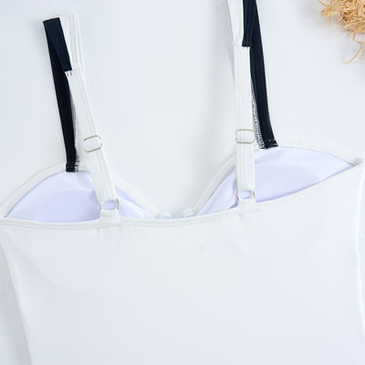 White one-piece women's swimsuit with black side panels and straps, featuring a ruched bust and U-shaped detail. - Image 18