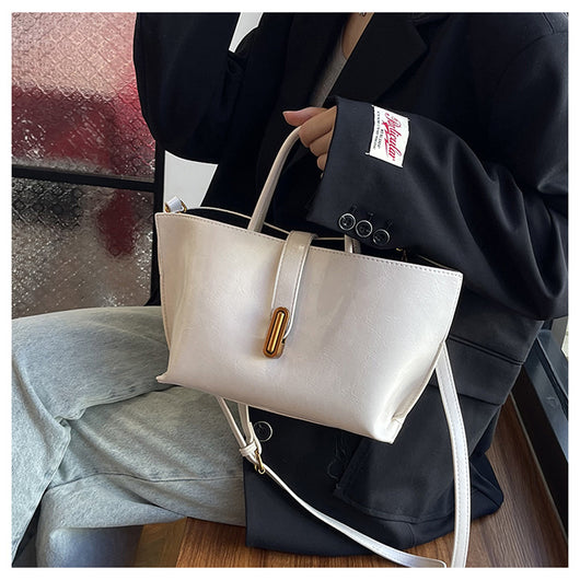 Bolso Bucket de Cuero Encerado Elegante y Portátil - Image 39